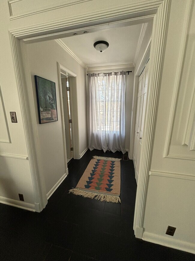 short hallway to main floor bathroom - 904 S Jordan Ave