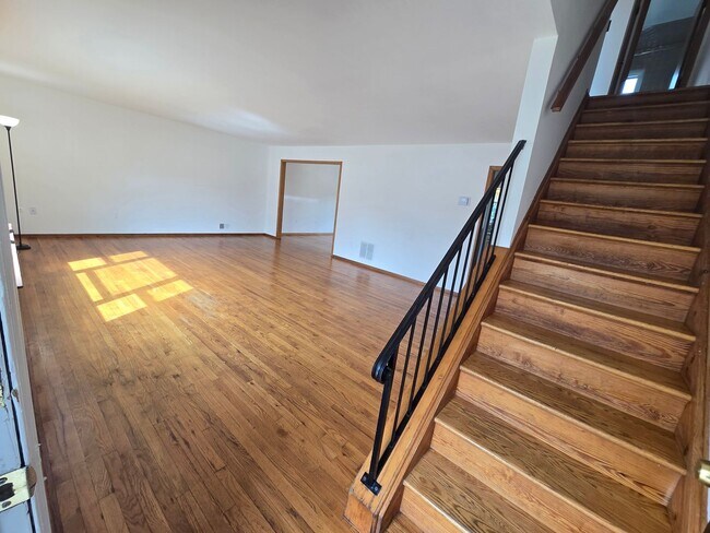 Building Photo - Updates abound at this SPACIOUS, half duplex with 3+ off-street parking spots, 3-bedrooms and 2 f...