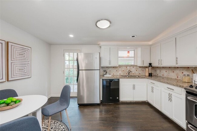 Building Photo - 7709 Woodrow Ave