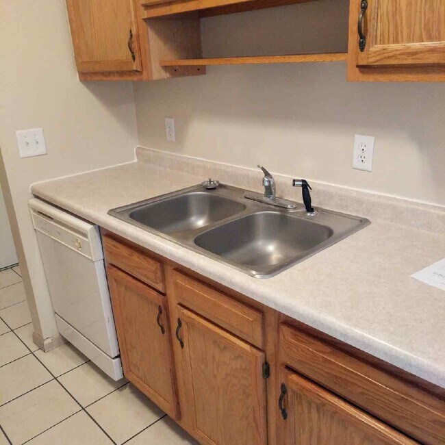 Building Photo - 8304 Zane Ave N