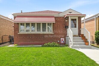 Building Photo - 5144 S Melvina Ave