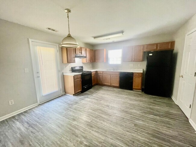 Building Photo - Come take a look at the gorgeous newly renovated 4 bedroom, 2.5 bath, 2 car garage home located i...