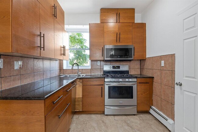 Building Photo - 310 Paterson Plank Rd