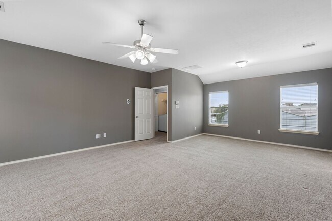 Building Photo - Come see this modern 3-story townhome in t...