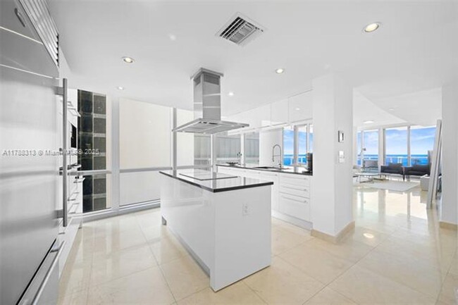 Building Photo - 17121 Collins Ave