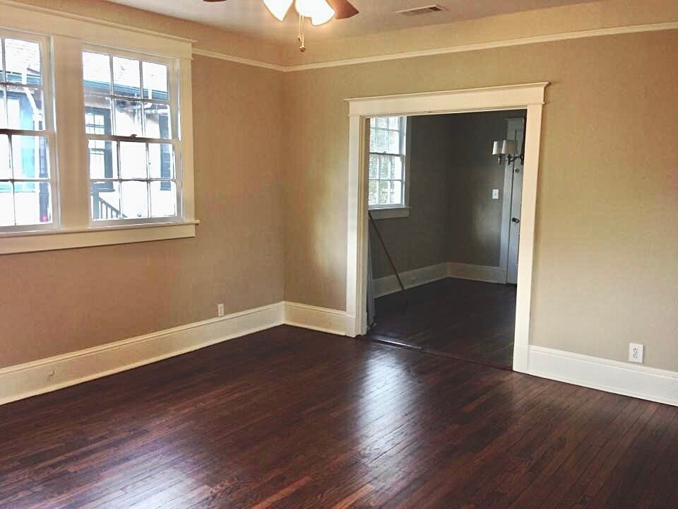 View of living room to dining room and screened porch - 1217 Foucher St
