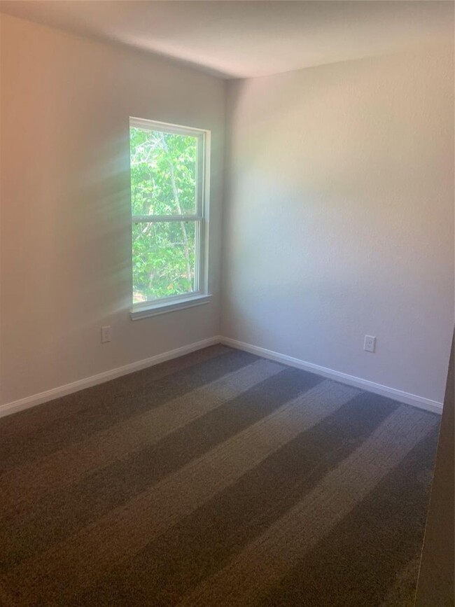 Building Photo - This home is a brand new beauty tucked bac...