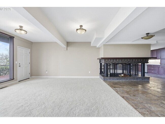 Building Photo - One-of-a-Kind 5BR Home with Floor-to-Ceiling Windows, Wraparound Decks & Breathtaking Treeline Views