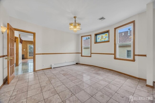 Building Photo - 128 E Colfax Ave