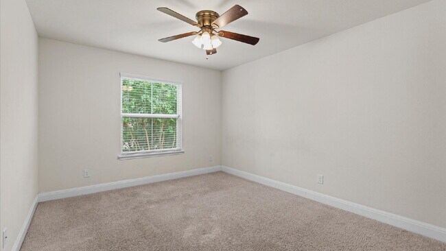 Building Photo - Spacious 4-Bedroom Home with a Backyard Oasis!