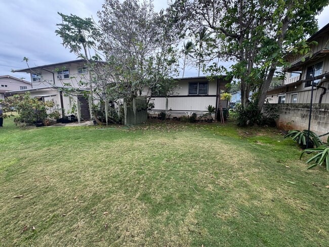 Building Photo - Completely Renovated 2 Bedroom/ 1 Bath with Ocean Access, Yard, Storage, Carport, A/C, Pets Allowed