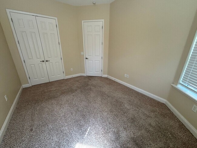 Building Photo - Spacious 4BR/3BA Home with 3-Car Garage, Bonus Office & Covered Patio in St Johns!