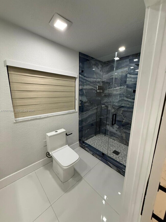 Building Photo - 10460 SW 26th Terrace