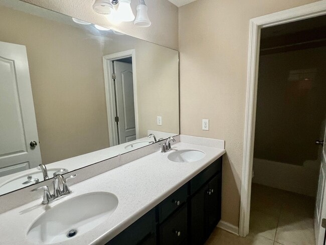 Building Photo - Spacious 5-Bedroom Home with Lawn Care Included!
