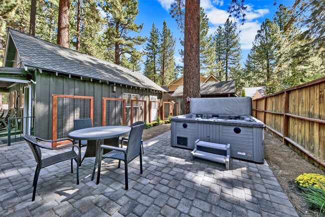 Backyard with hot tub, BBQ and dining table (in-law unit next door not included) - 1139 Craig Ave