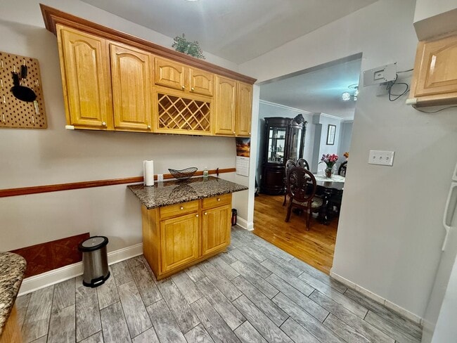 Building Photo - SPACIOUS & MODERN 3 BED/1.5 BA HOUSE w/ Central AC-HARDWOOD Flooring-WASHER/DRYER & Rear PATIO in...