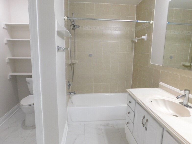 Upstairs Hall Bath with Tub & Water Closet - 10828 Miller Rd