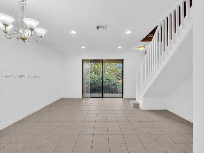 Building Photo - 3873 Tree Top Dr