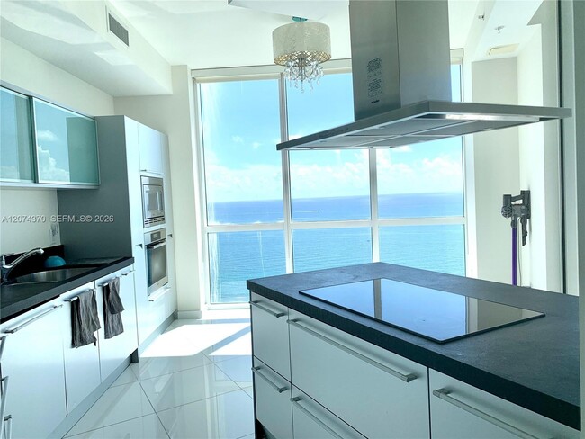 Building Photo - 18201 Collins Ave