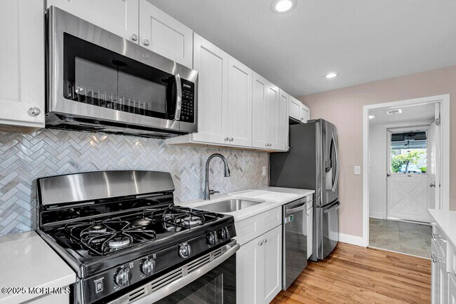 Building Photo - 18 Cotswold Cir