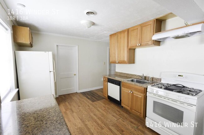 Building Photo - RENOVATED 3 Bed, 3 Bath with 2 Car Enclose...