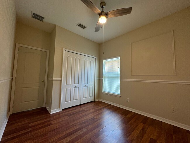 Building Photo - Beautiful 3/2 home near Lake Nona ~ Fenced In Yard ~ LVP & Tile Flooring ~ Community Pool!