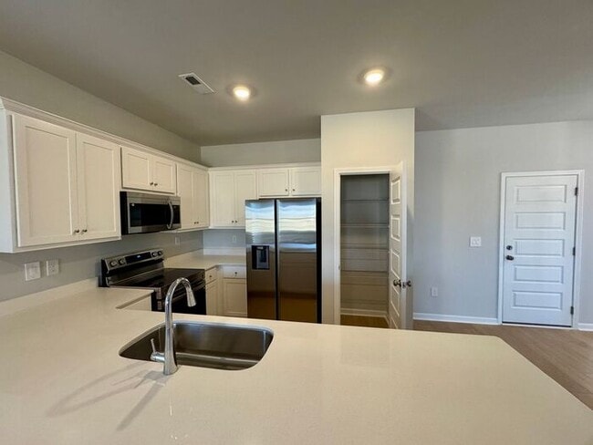 Building Photo - MOVE IN SPECIAL-NEW CONSTRUCTION-FENCED YARD