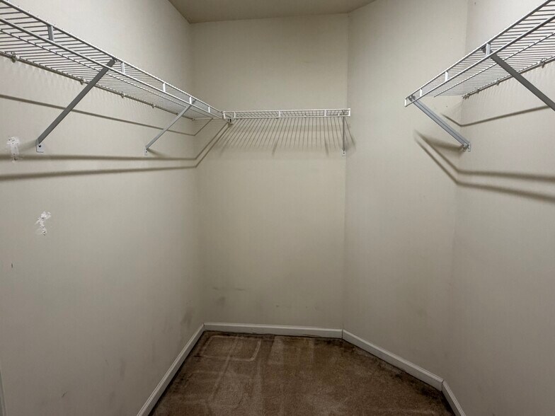 Primary suite walk-in closet and there is a secondary closet as well - 6419 Woodmont Rd