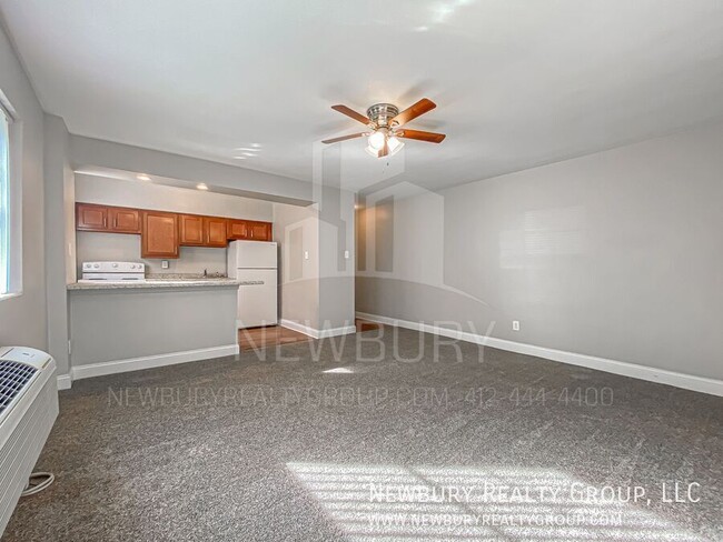 Building Photo - Modern One-Bedroom Apartment in Port Vue: ...