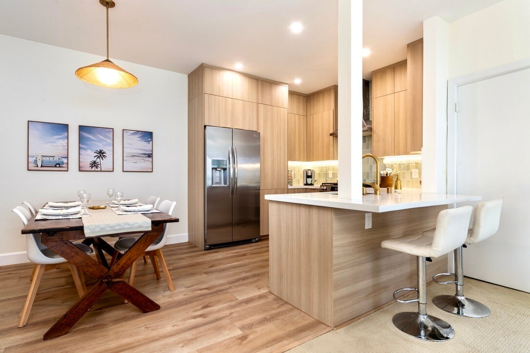 Fully remodeled kitchen with open flow and breakfast bar seating - 2221 Ocean Ave
