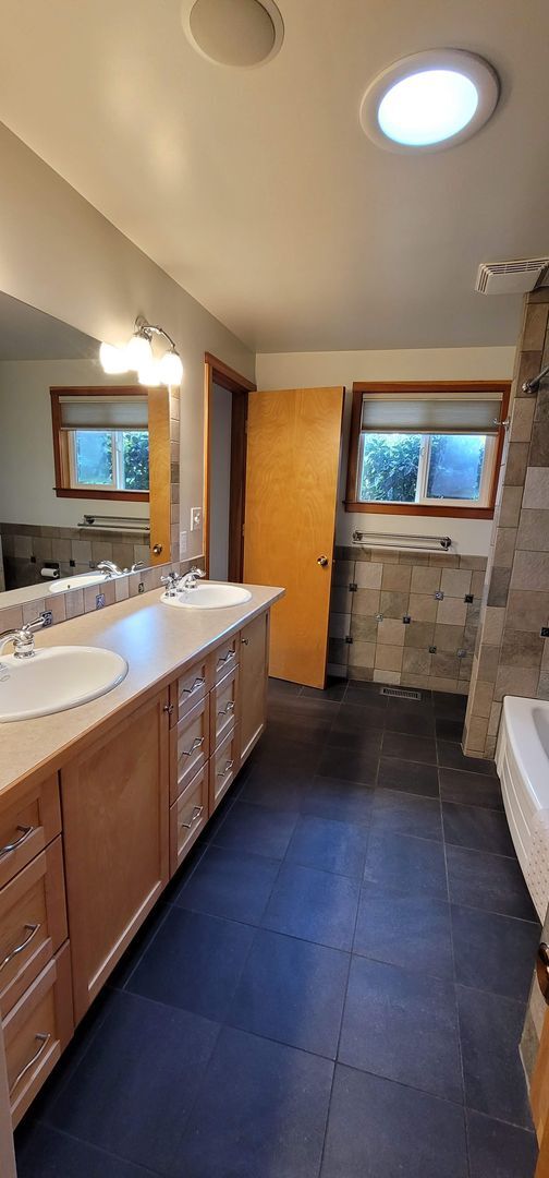 Building Photo - Gorgeous 4-bedroom home including a Two Car Garage and Spacious Backyard with a Shaded Patio