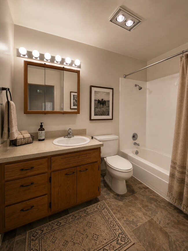 Building Photo - Keyless Entry • On-Site Laundry • Free WiFi