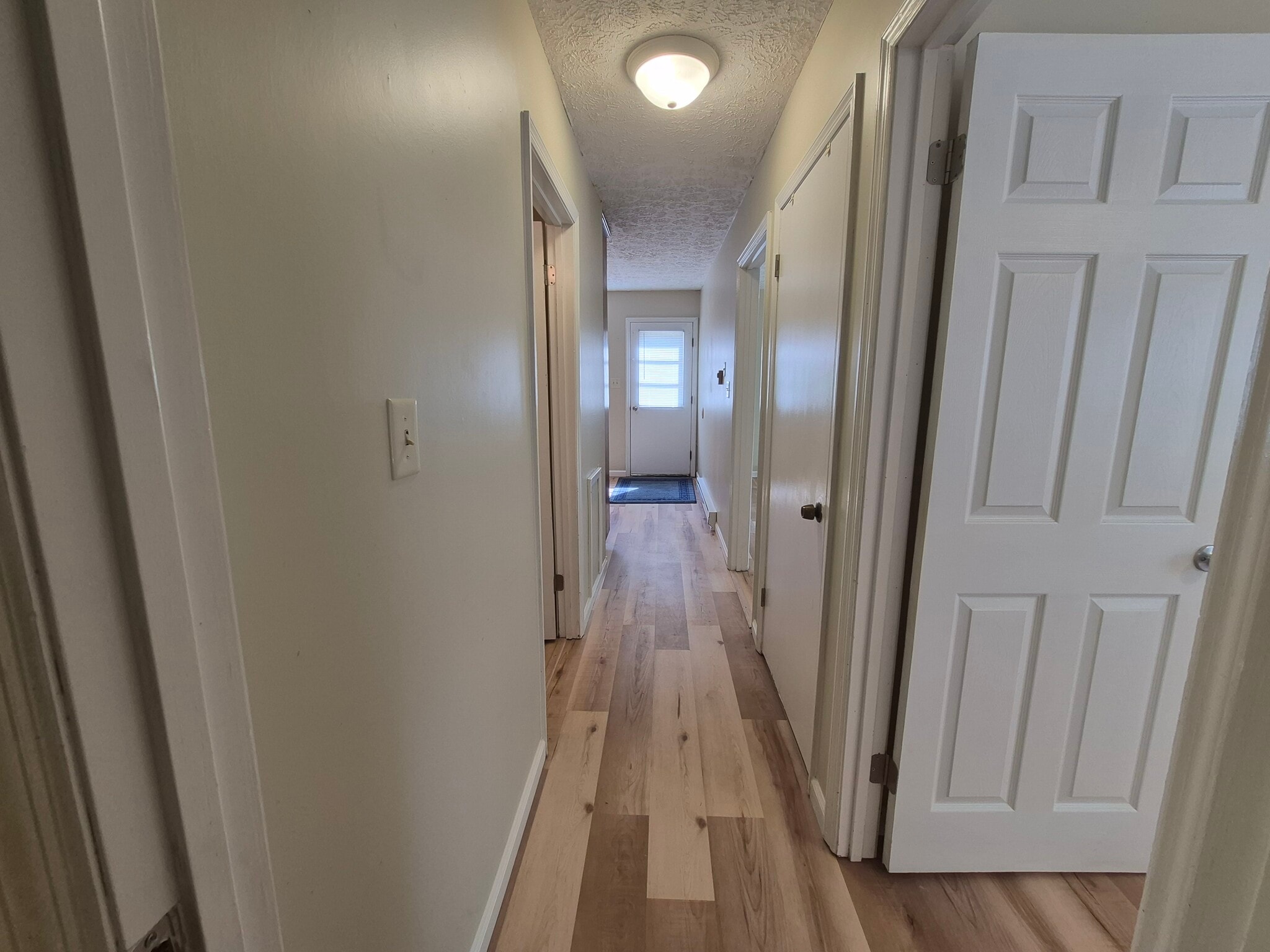 Hallway to entry - 128 Morgan Drive