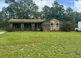 Building Photo - Charming 4-Bedroom Home in a Great Neighborhood with a Spacious Yard!