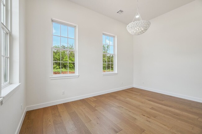 Building Photo - Classic Cape Cod Meets Modern Glam: Your D...