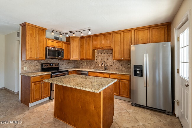 Building Photo - 8303 E Glenrosa Ave