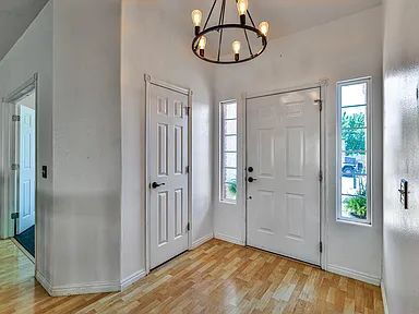 Building Photo - "Charming 4-Bed Oasis with Elegant Hardwoo...