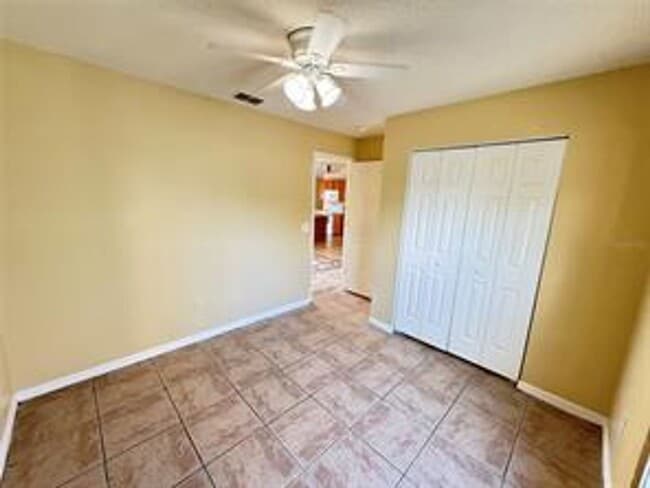 Building Photo - Charming 3-bed, 2-bath POOL home with 2-car garage. Features ceramic tile flooring, updated kitch...