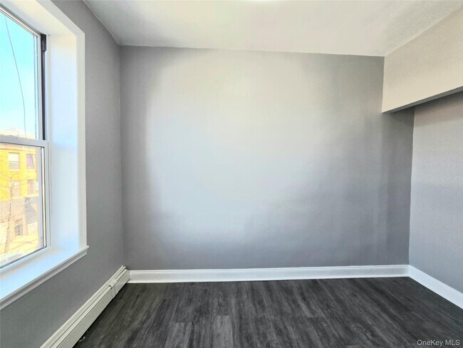 Building Photo - 56-46 Myrtle Ave