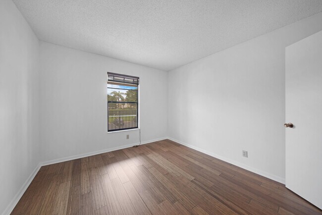 Building Photo - 9480 Boca Cove Cir