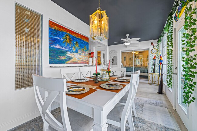 Dine in the Florida Room with uninterruped views - 1741 NW 39th St