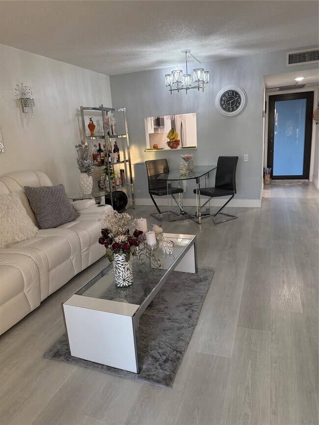 Building Photo - 9360 Lime Bay Blvd