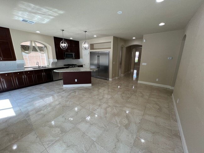 Building Photo - A Fantastic 4 Bedroom Home with the primary Downstairs, in Silverado Ranch