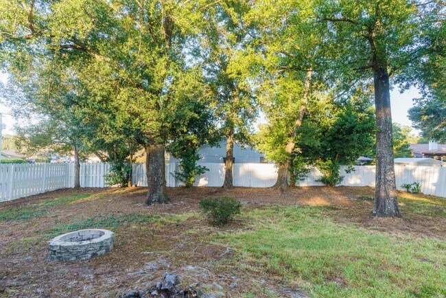 Building Photo - Charming Corner Haven 4BR/3BA Brick Home for Rent