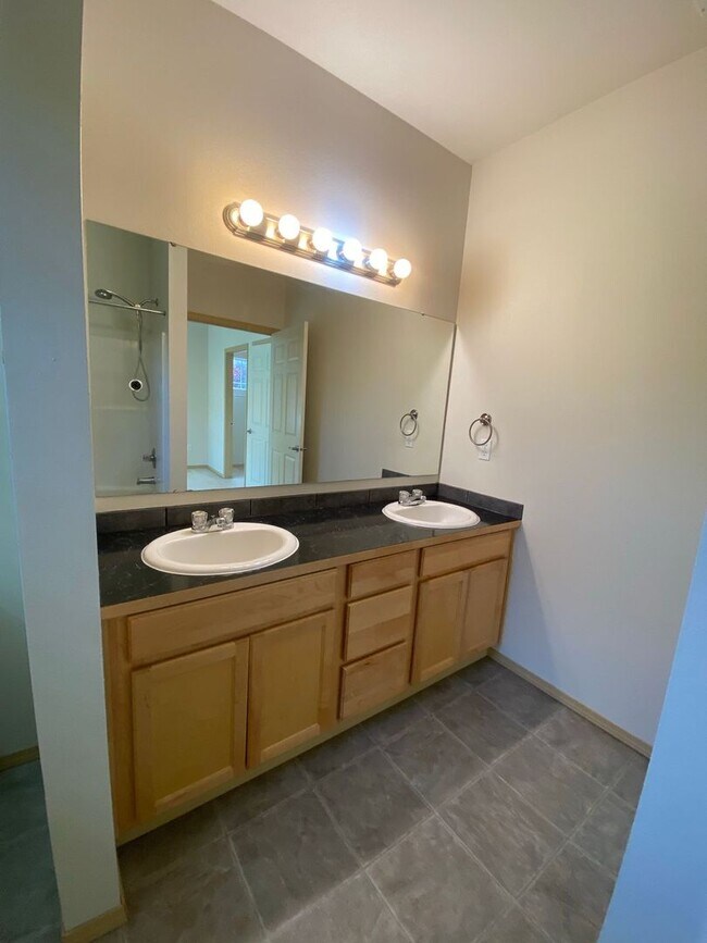 Building Photo - No Mower Needed! Great Townhome In A Beaut...