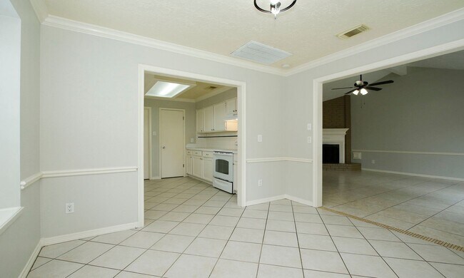 Building Photo - 4 Bedroom 2 Bathroom Cypress Home with Fireplace and Fenced Backyard