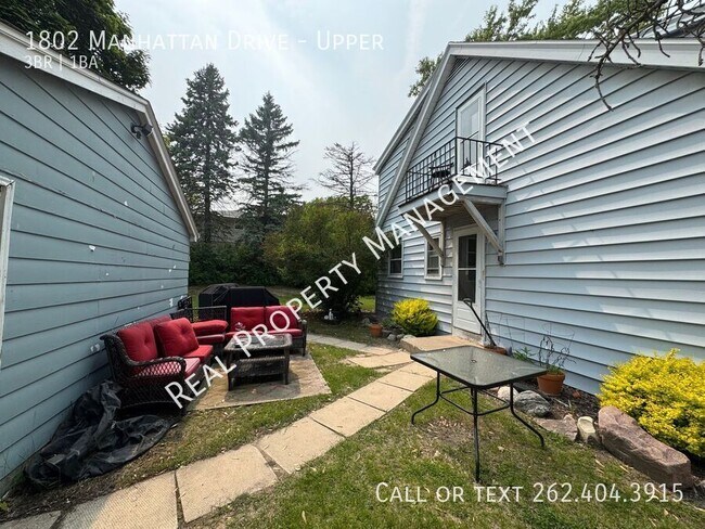 Building Photo - 1802 Manhattan Dr