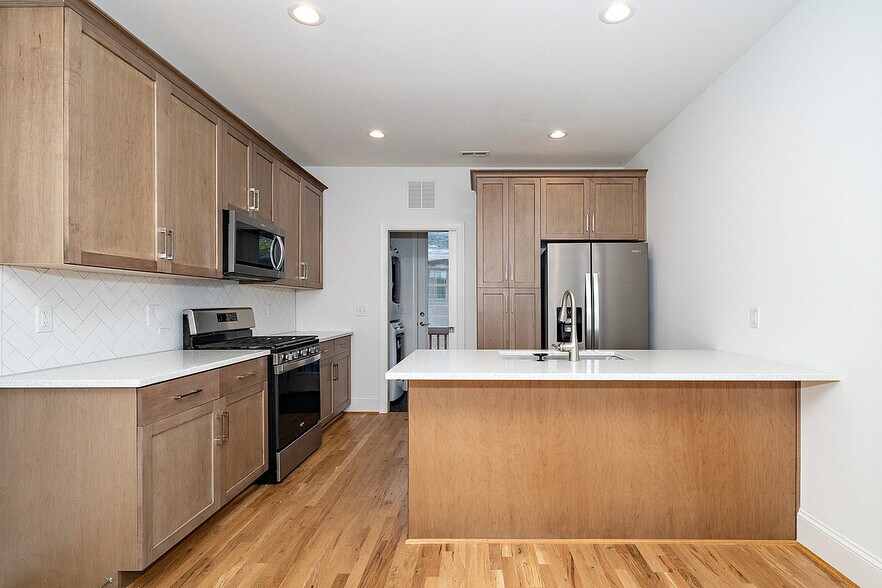 Redfield-Villages-Apartment-Homes-Near-NC-State-105.5-Turner-St-Fully-Equipped-Kitchen - Redfield Villages