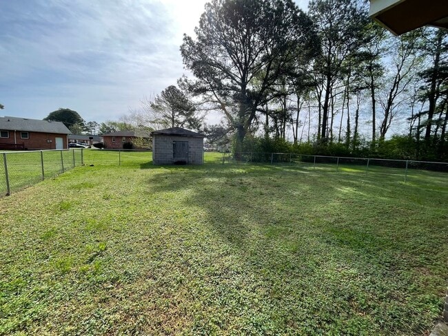 Building Photo - Spacious Home with Large Yard, Hot Tub, and More