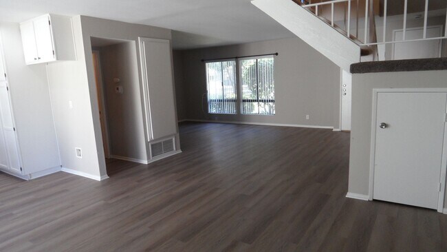 Building Photo - Two Story 4 BR 2.5 BA Condo With 2 Car Garage